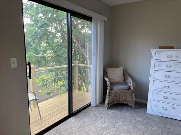 a room with a bed and a window