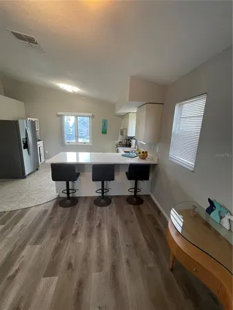 a workspace with furniture and window