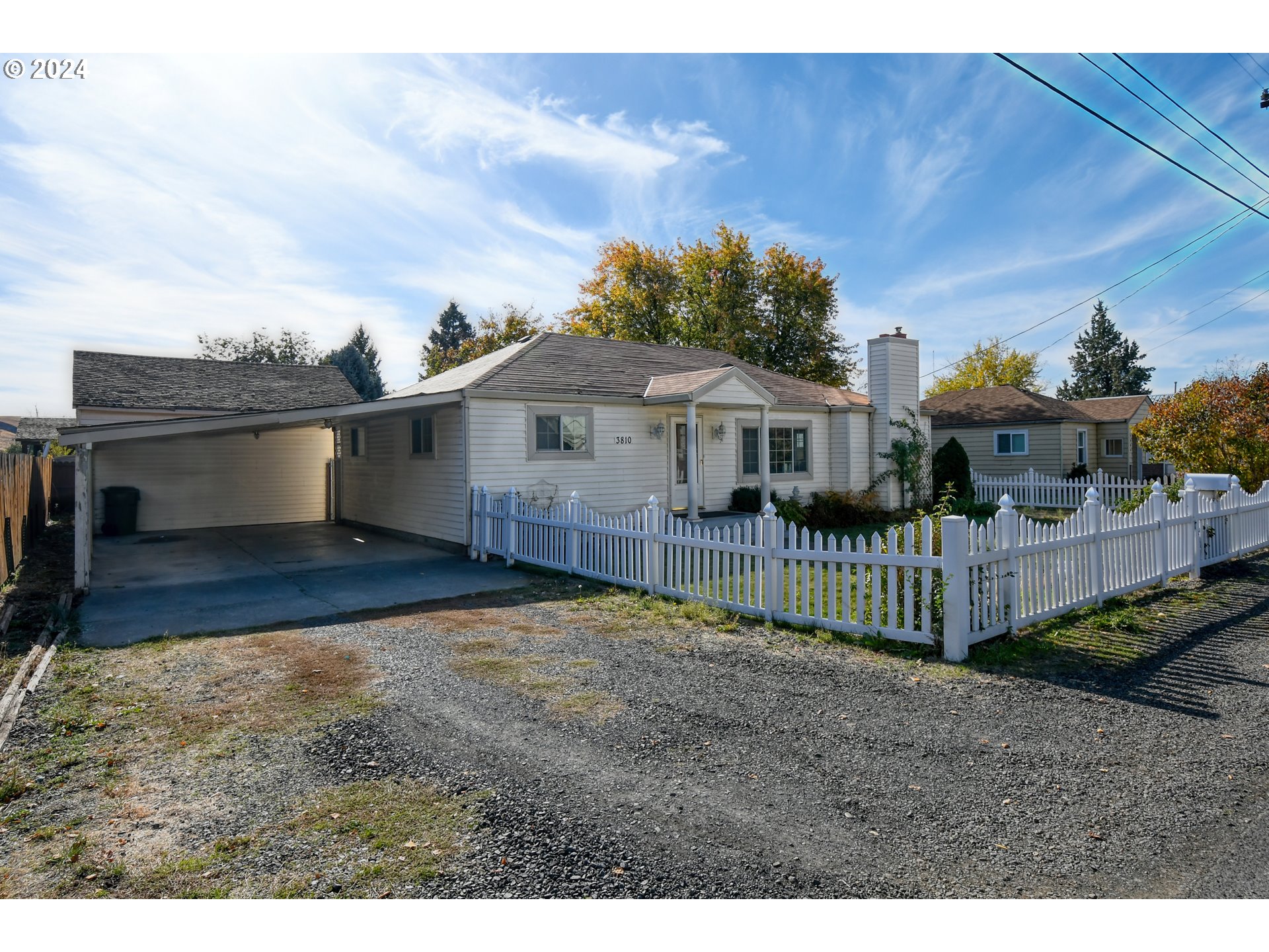 3810 Northeast Riverside Avenue Pendleton, OR 97801 - Photo 3 of 45 a view of a house with wooden fence