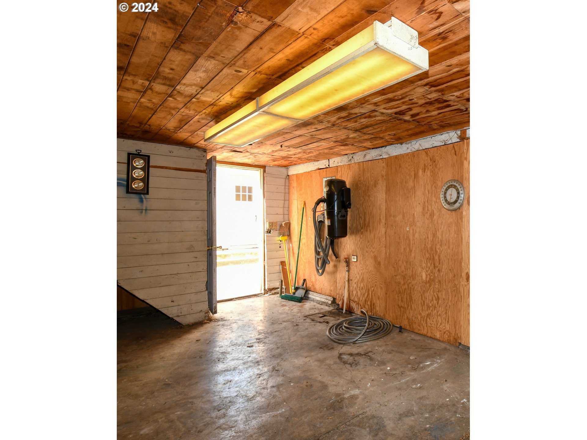 3810 Northeast Riverside Avenue Pendleton, OR 97801 - Photo 37 of 45 a view of a room with wooden walls