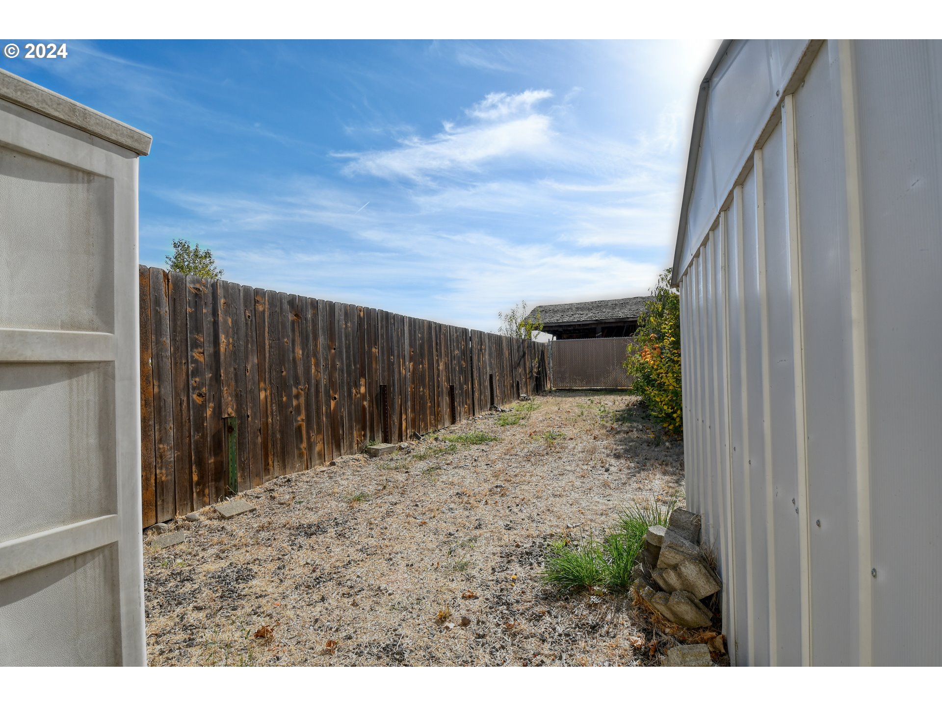 3810 Northeast Riverside Avenue Pendleton, OR 97801 - Photo 41 of 45 a backyard of a house