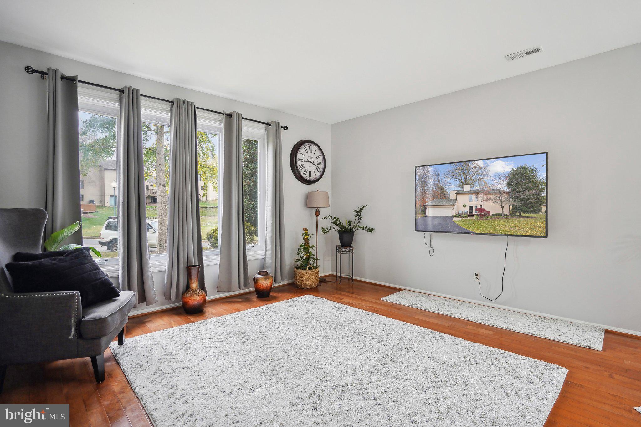 3111 Courtside Road Bowie, MD 20721 - Photo 22 of 41 a view of a livingroom with furniture and window
