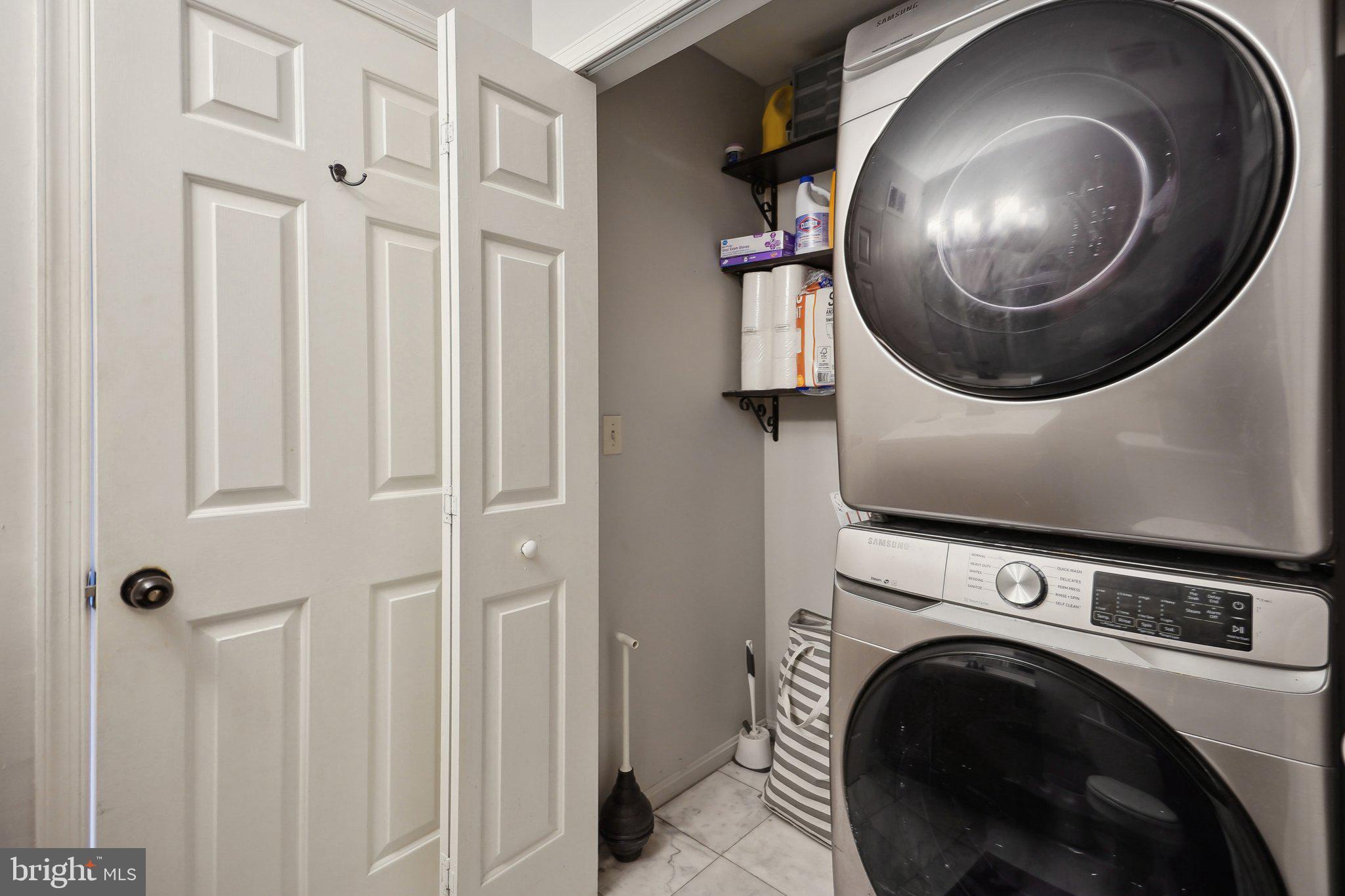 3111 Courtside Road Bowie, MD 20721 - Photo 31 of 41 a view of a hallway with washer and dryer