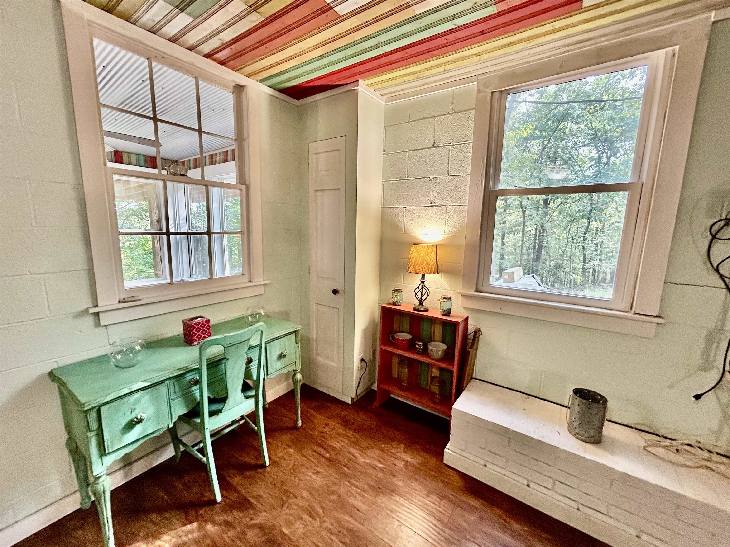 460 Port Lane Counce, TN 38326 - Photo 9 of 23 Home office featuring concrete block wall and dark wood-style floors