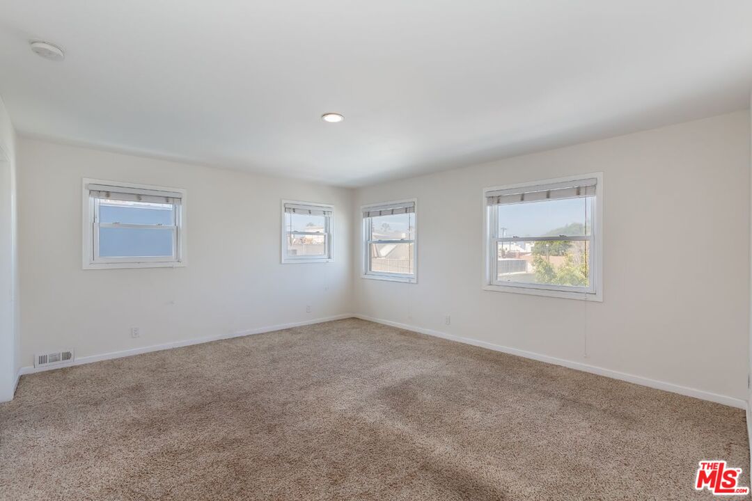 27 Buccaneer Street Marina del Rey, CA 90292 - Photo 7 of 15 a view of an empty room with a window