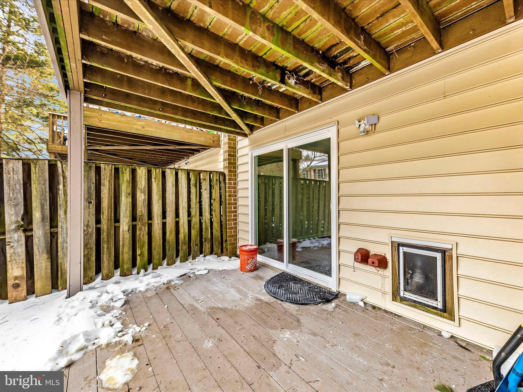 9923 Maple Leaf Drive Gaithersburg, MD 20886 - Photo 36 of 38 a view of porch with wooden floor