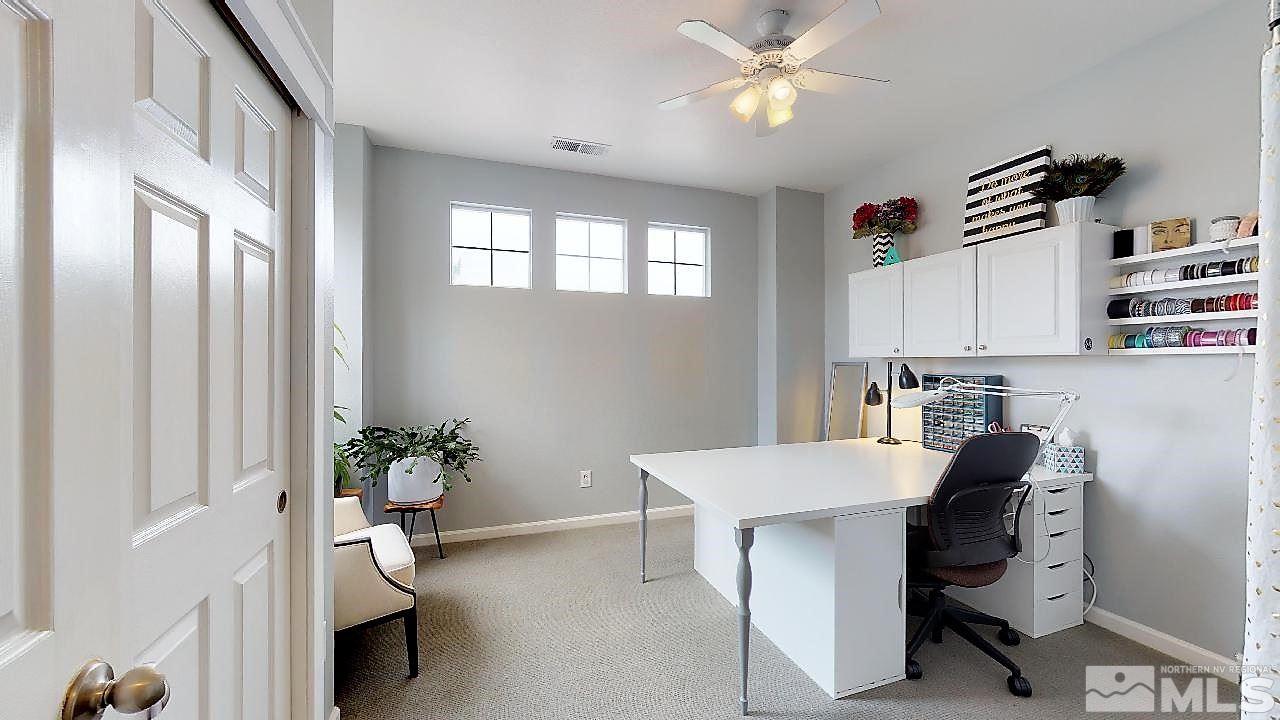 10290 Wolf Ridge Way Reno, NV 89521 - Photo 22 of 22 a workspace with furniture and window