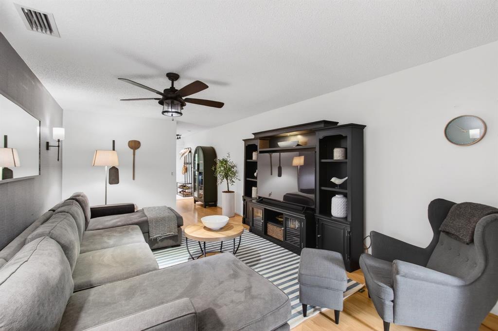 6621 Via Regina, Unit 6621 Boca Raton, FL 33433 - Photo 25 of 100 a living room with furniture and a rug
