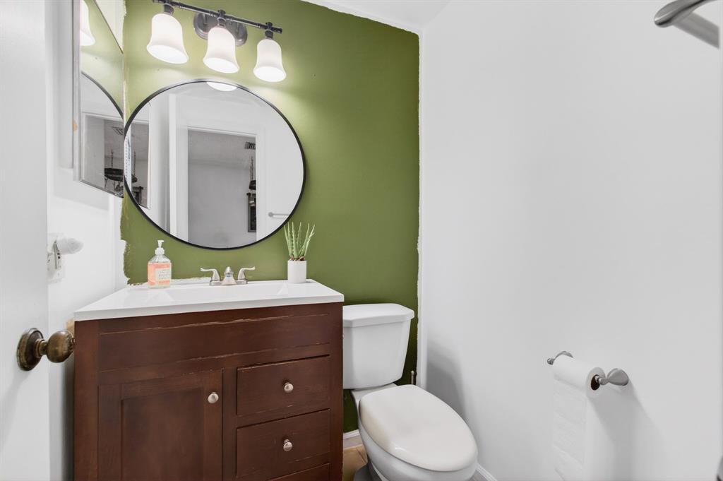 6621 Via Regina, Unit 6621 Boca Raton, FL 33433 - Photo 27 of 100 a bathroom with a toilet mirror vanity and a sink