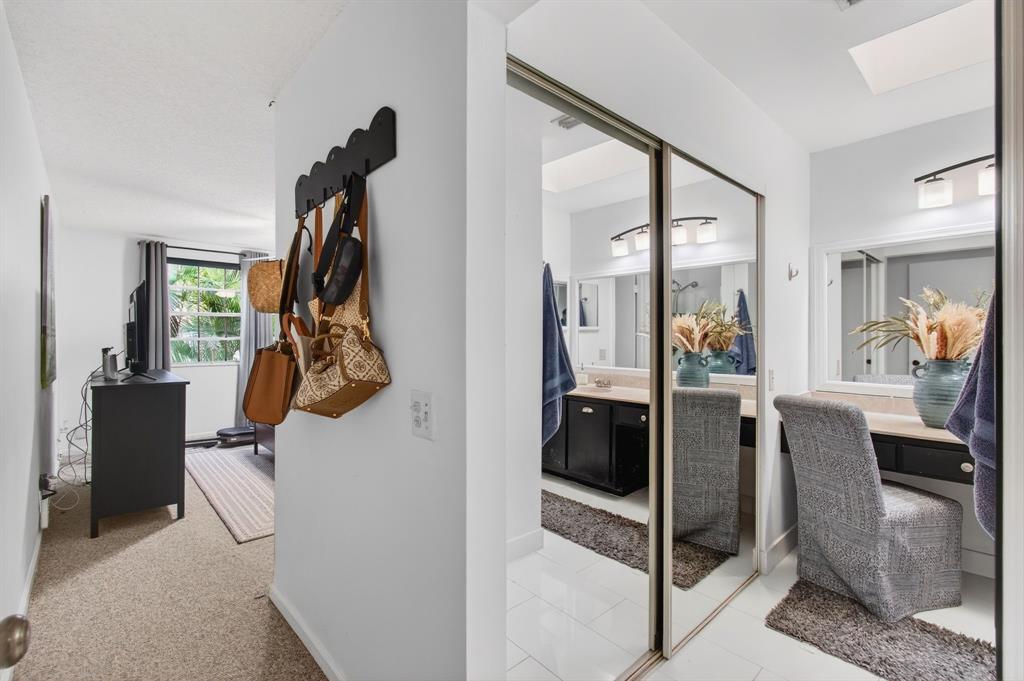 6621 Via Regina, Unit 6621 Boca Raton, FL 33433 - Photo 35 of 100 a view of a living room and bathroom