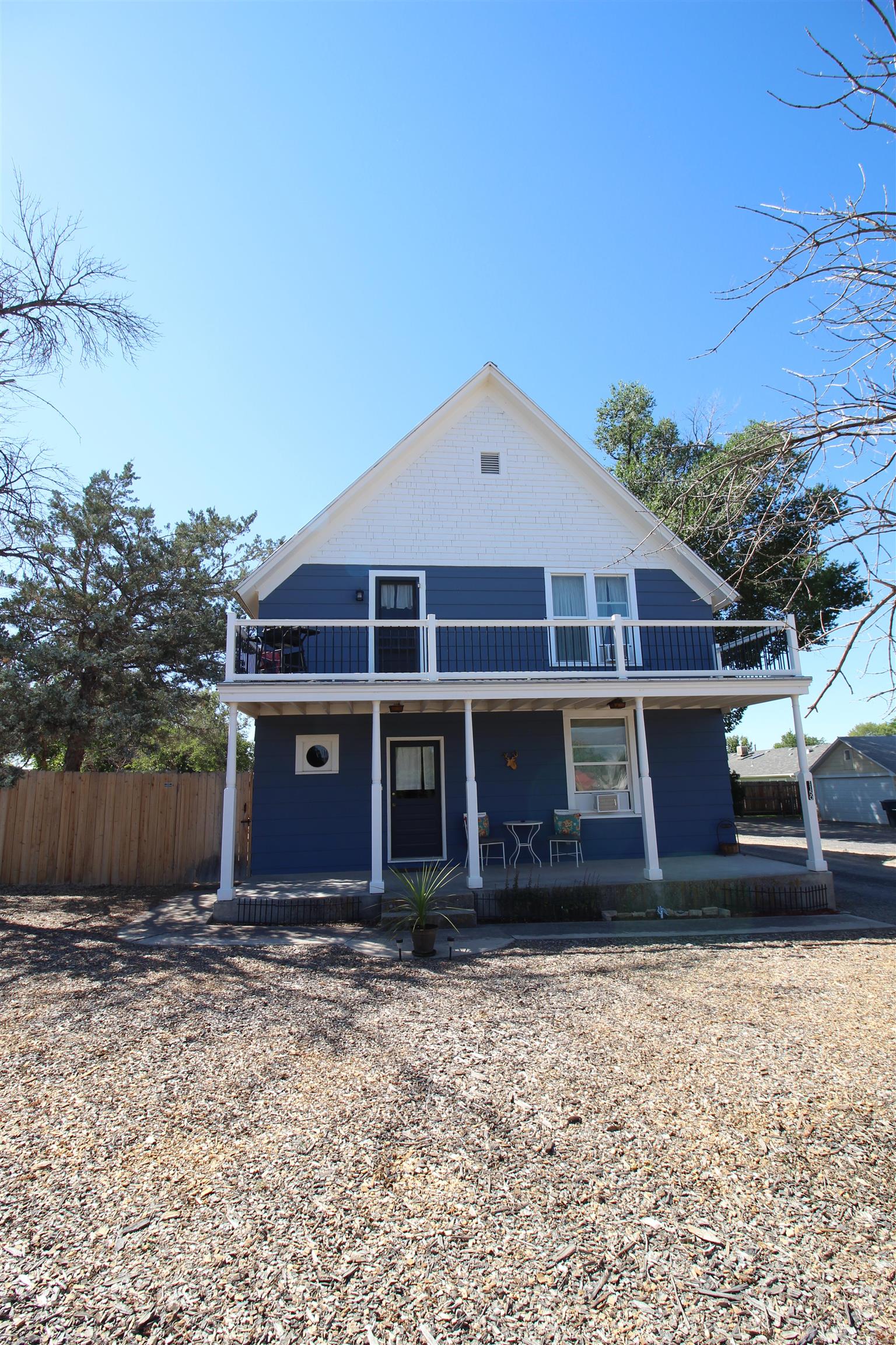 1150 East 7th Street Delta, CO 81416 - Photo 1 of 32 a front view of a house with a yard