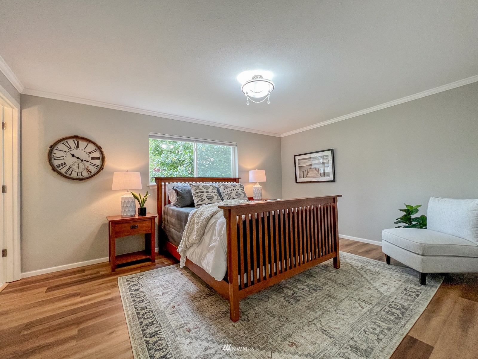 2416 165th Place Southeast Bothell, WA 98012 - Photo 16 of 39 a bedroom with a bed and a couch