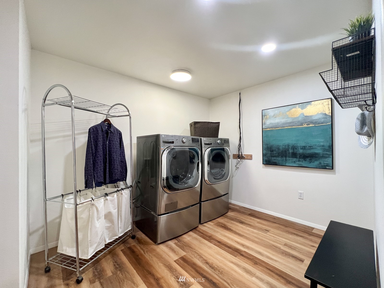2416 165th Place Southeast Bothell, WA 98012 - Photo 27 of 39 a view of a livingroom with washer and dryer