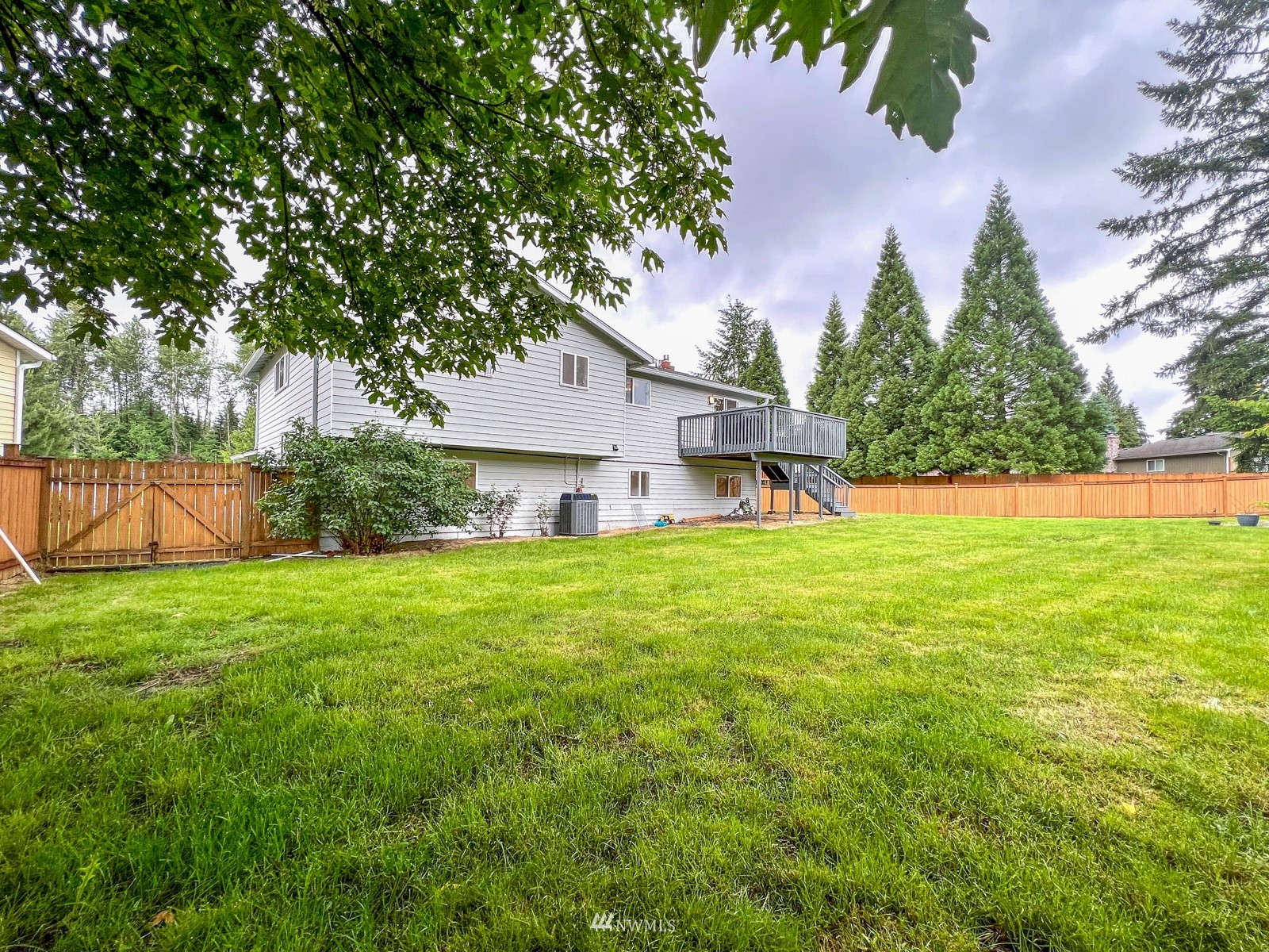 2416 165th Place Southeast Bothell, WA 98012 - Photo 35 of 39 a view of a house with a yard