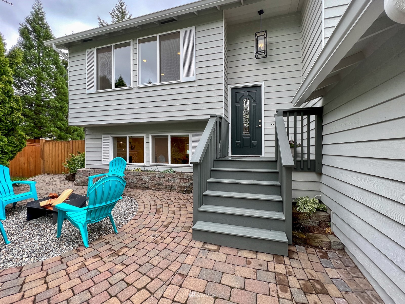 2416 165th Place Southeast Bothell, WA 98012 - Photo 4 of 39 a view of a house with backyard and sitting area