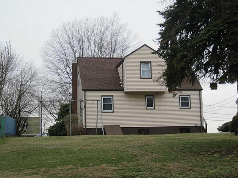 217 Crestview Road Penn Hills, PA 15235 - Photo 15 of 16 Exterior Back. Looking up from the bottom of the property you see how spacious the land is.