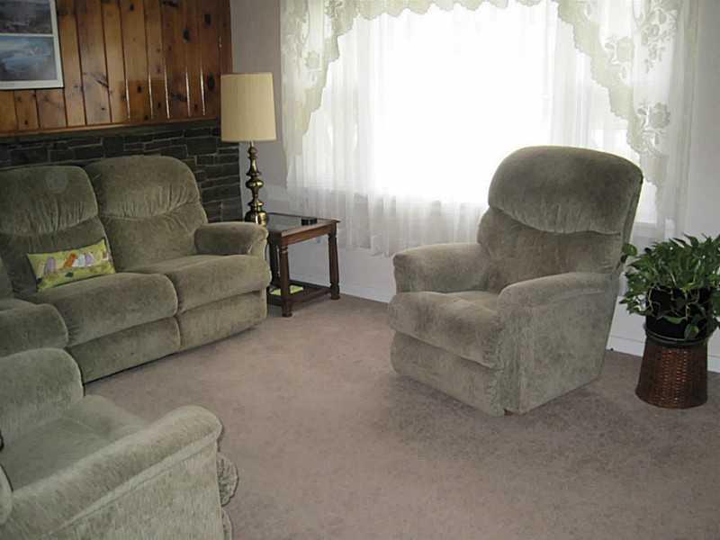 217 Crestview Road Penn Hills, PA 15235 - Photo 4 of 16 Living Room. New carpet is through the entire home. The picture window allows for abundance of natural light.