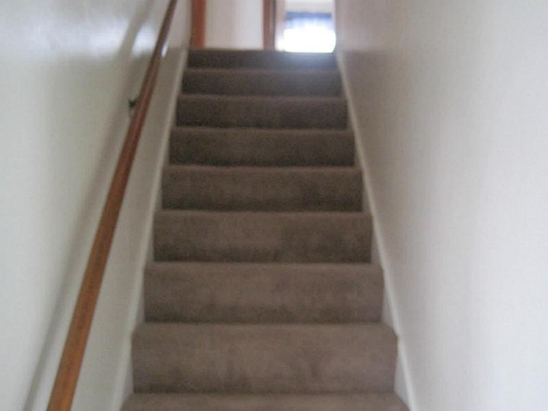 217 Crestview Road Penn Hills, PA 15235 - Photo 10 of 16 Entry/Foyer. Stairway to upstairs bedrooms and bath.