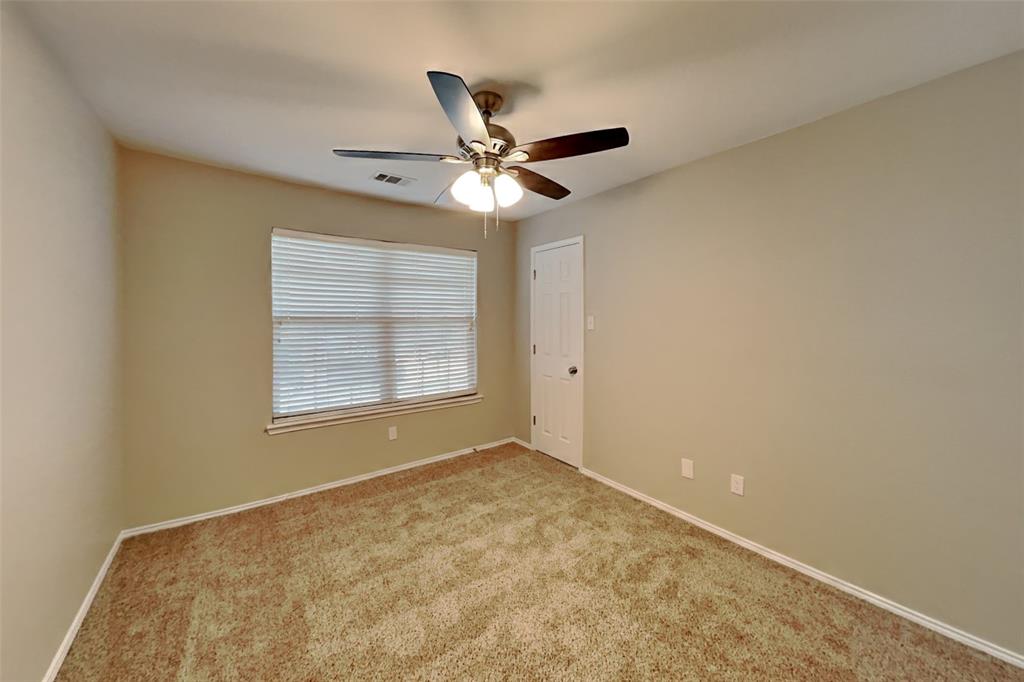 4204 Highgate Road Fort Worth, TX 76244 - Photo 12 of 19 Spare room featuring light carpet and ceiling fan