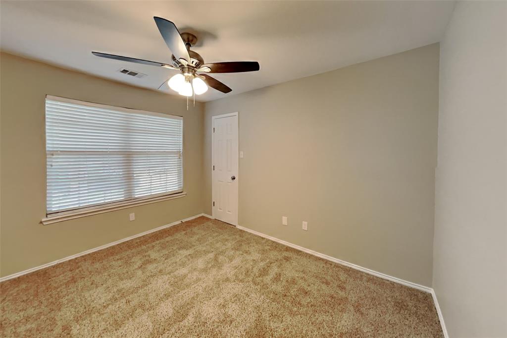 4204 Highgate Road Fort Worth, TX 76244 - Photo 13 of 19 Carpeted empty room with baseboards and ceiling fan