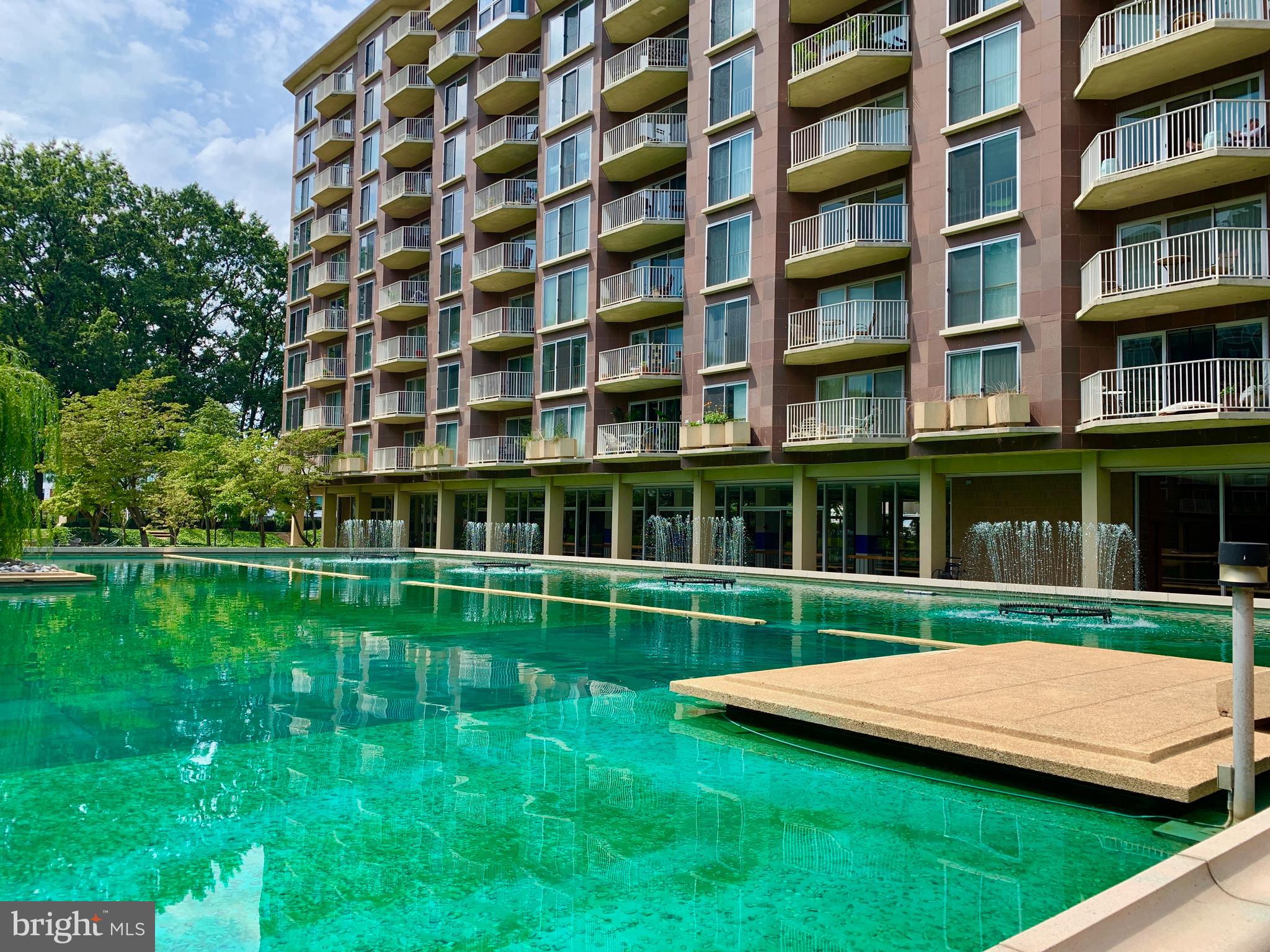 560 N Street Southwest, Unit N304 Washington, DC 20024 - Photo 1 of 22 a view of building with yard