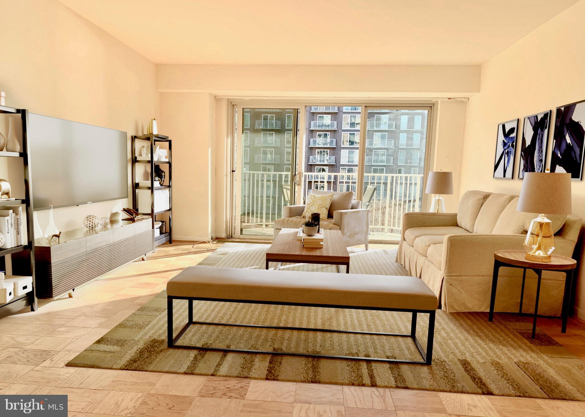 560 N Street Southwest, Unit N304 Washington, DC 20024 - Photo 2 of 22 a living room with furniture and a large window