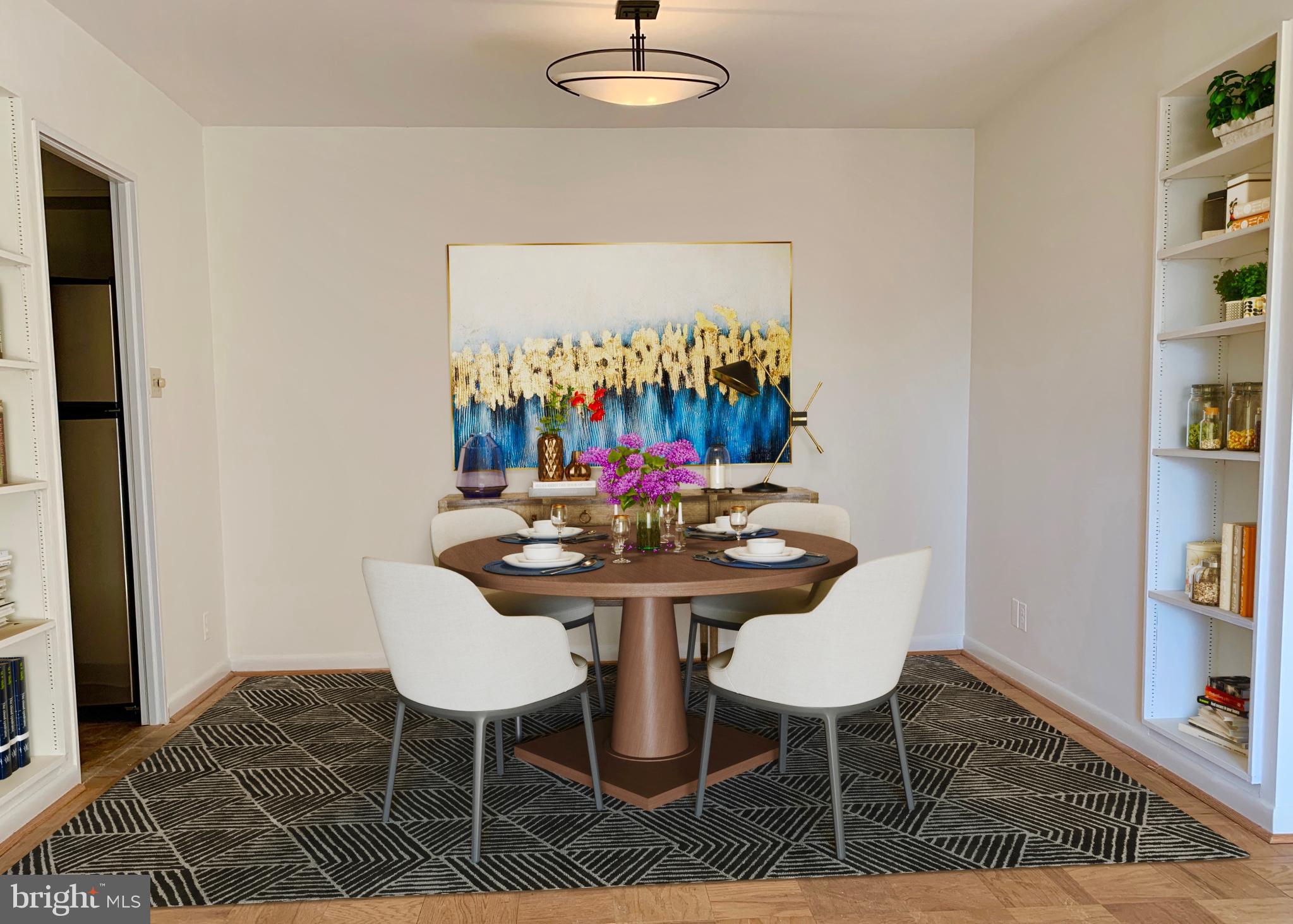 560 N Street Southwest, Unit N304 Washington, DC 20024 - Photo 4 of 22 a view of a dining room with furniture and a rug