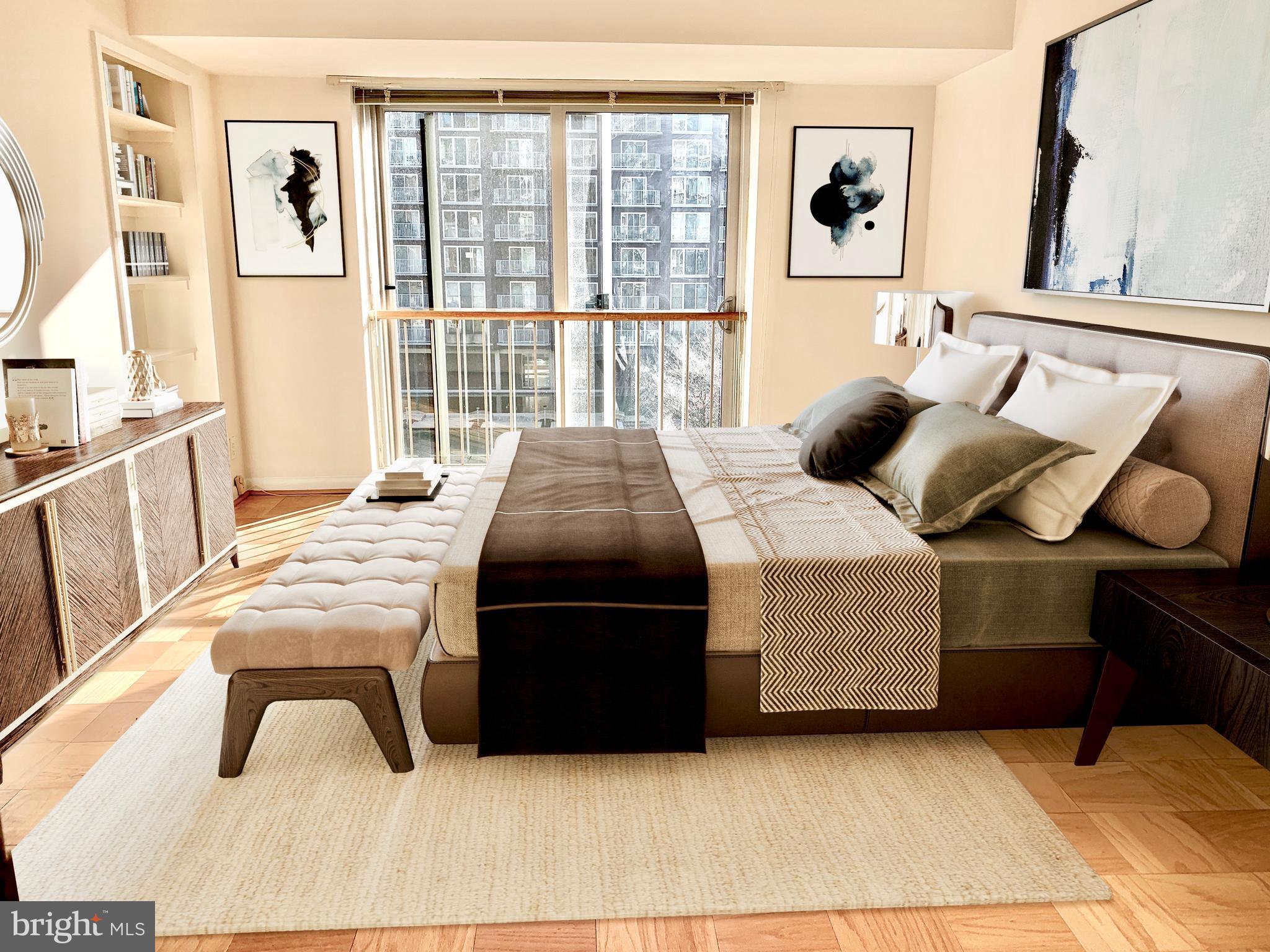 560 N Street Southwest, Unit N304 Washington, DC 20024 - Photo 5 of 22 a bedroom with a bed and a large window