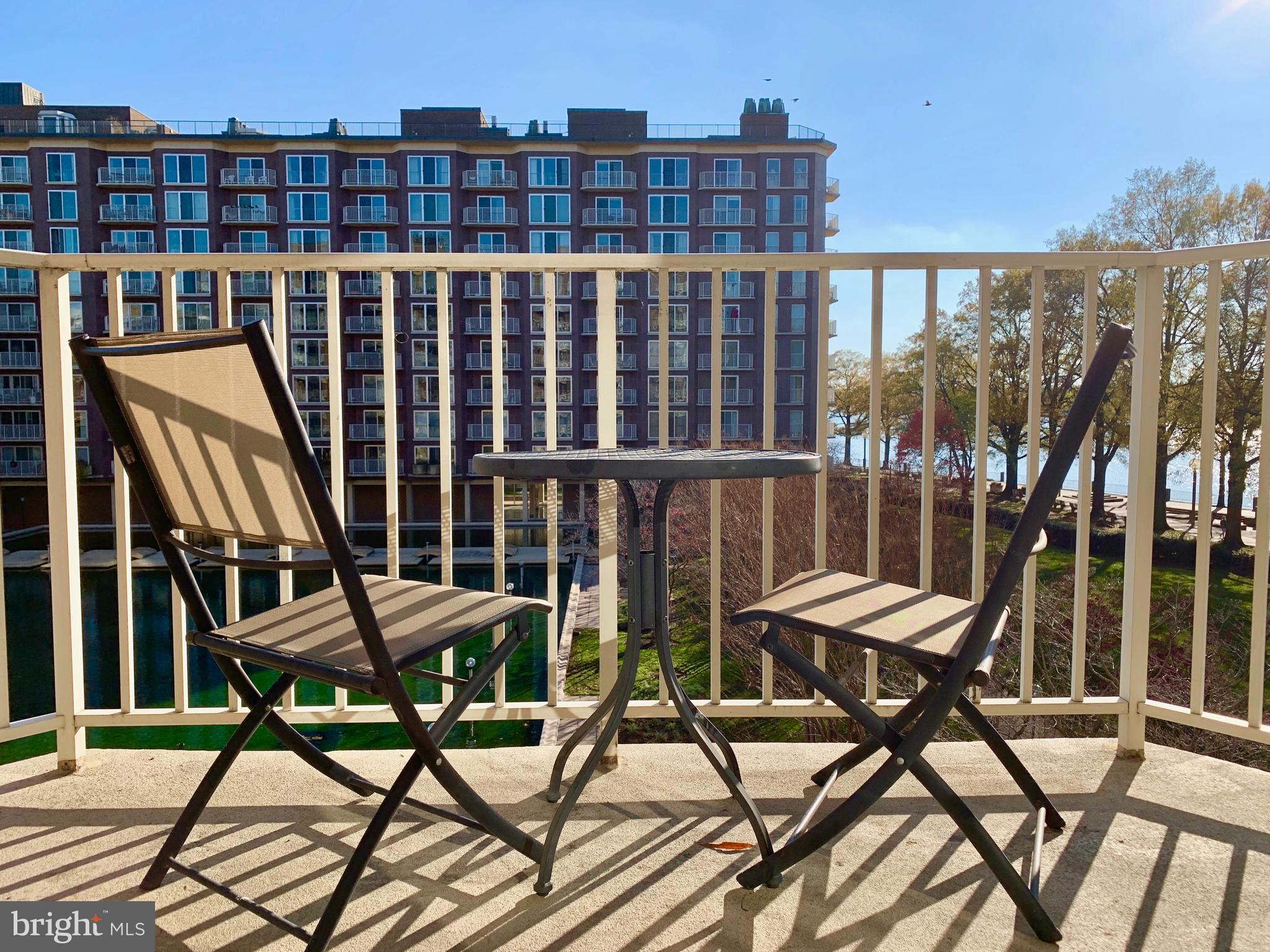 560 N Street Southwest, Unit N304 Washington, DC 20024 - Photo 6 of 22 a view of a balcony with chairs