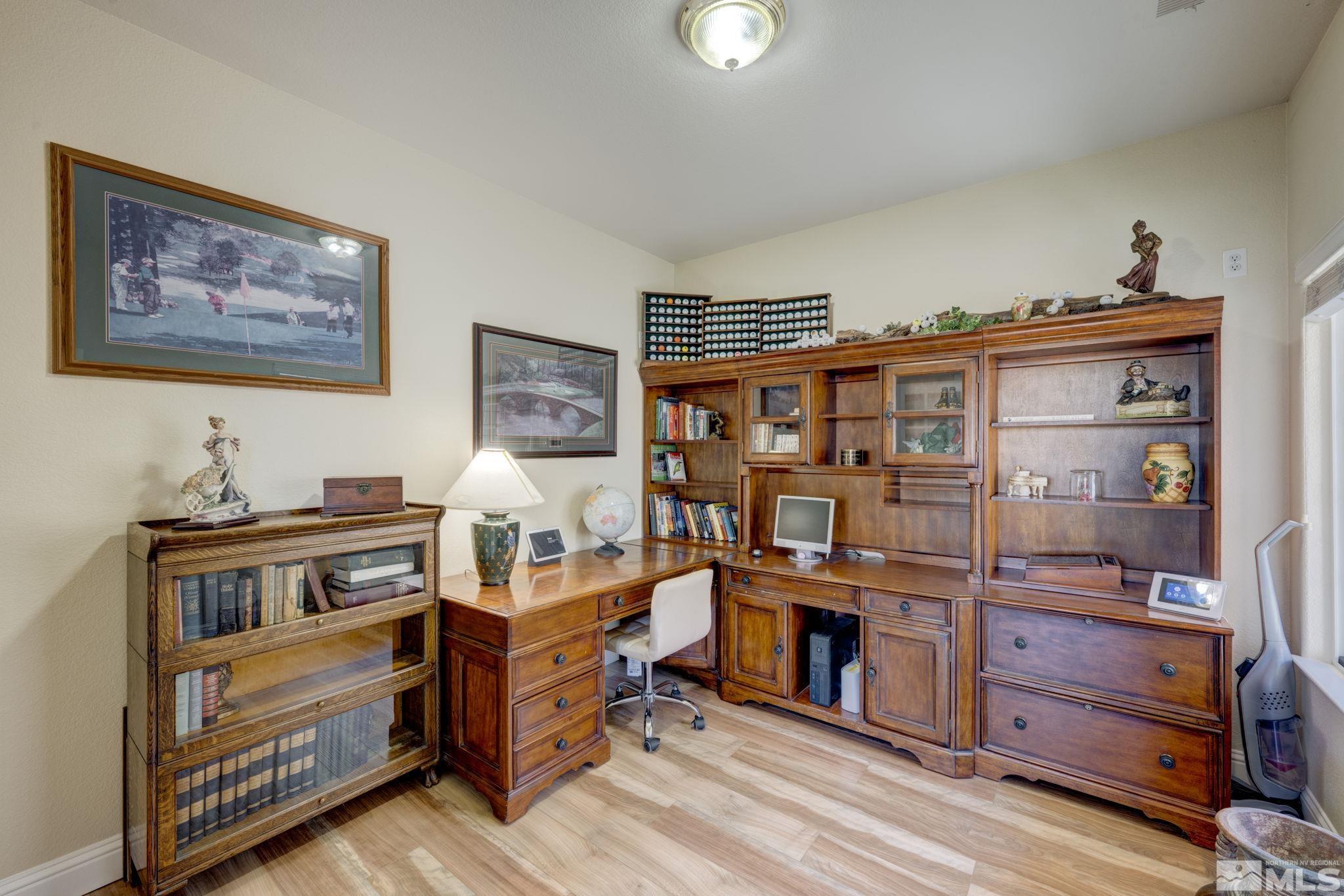 1825 D'Arques Court Reno, NV 89521 - Photo 11 of 40 a view of a workspace with furniture