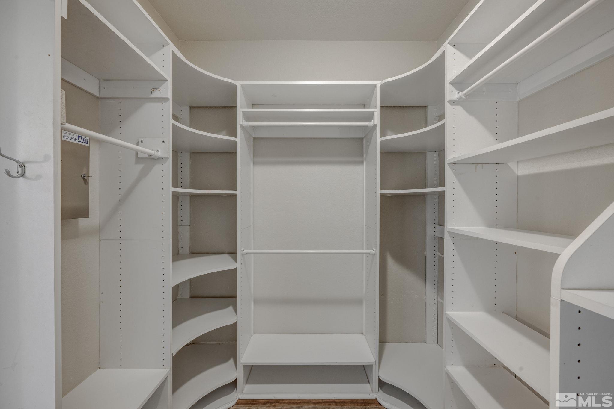 1825 D'Arques Court Reno, NV 89521 - Photo 26 of 40 a view of walk in closet with empty racks