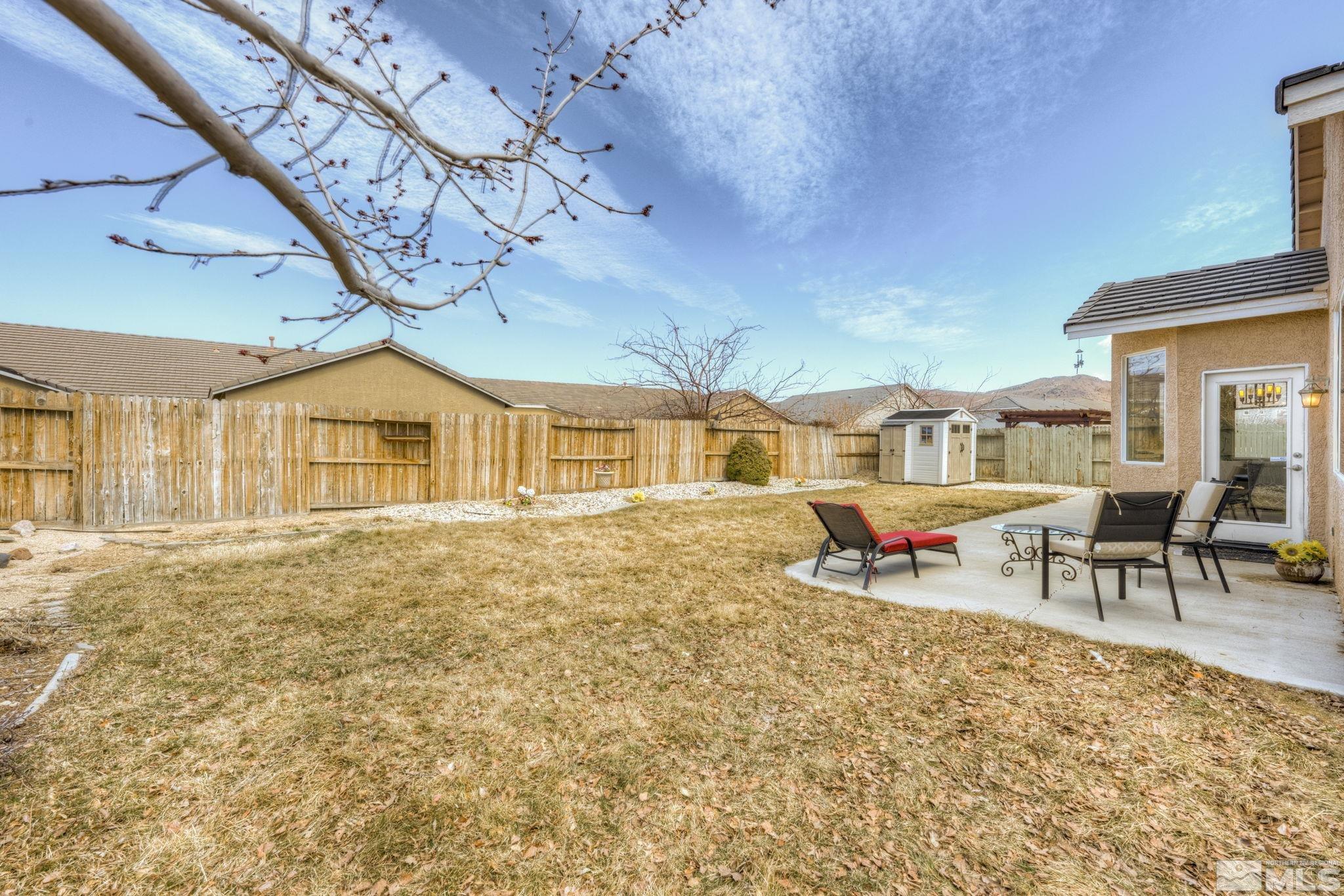 1825 D'Arques Court Reno, NV 89521 - Photo 36 of 40 a view of a house with a patio