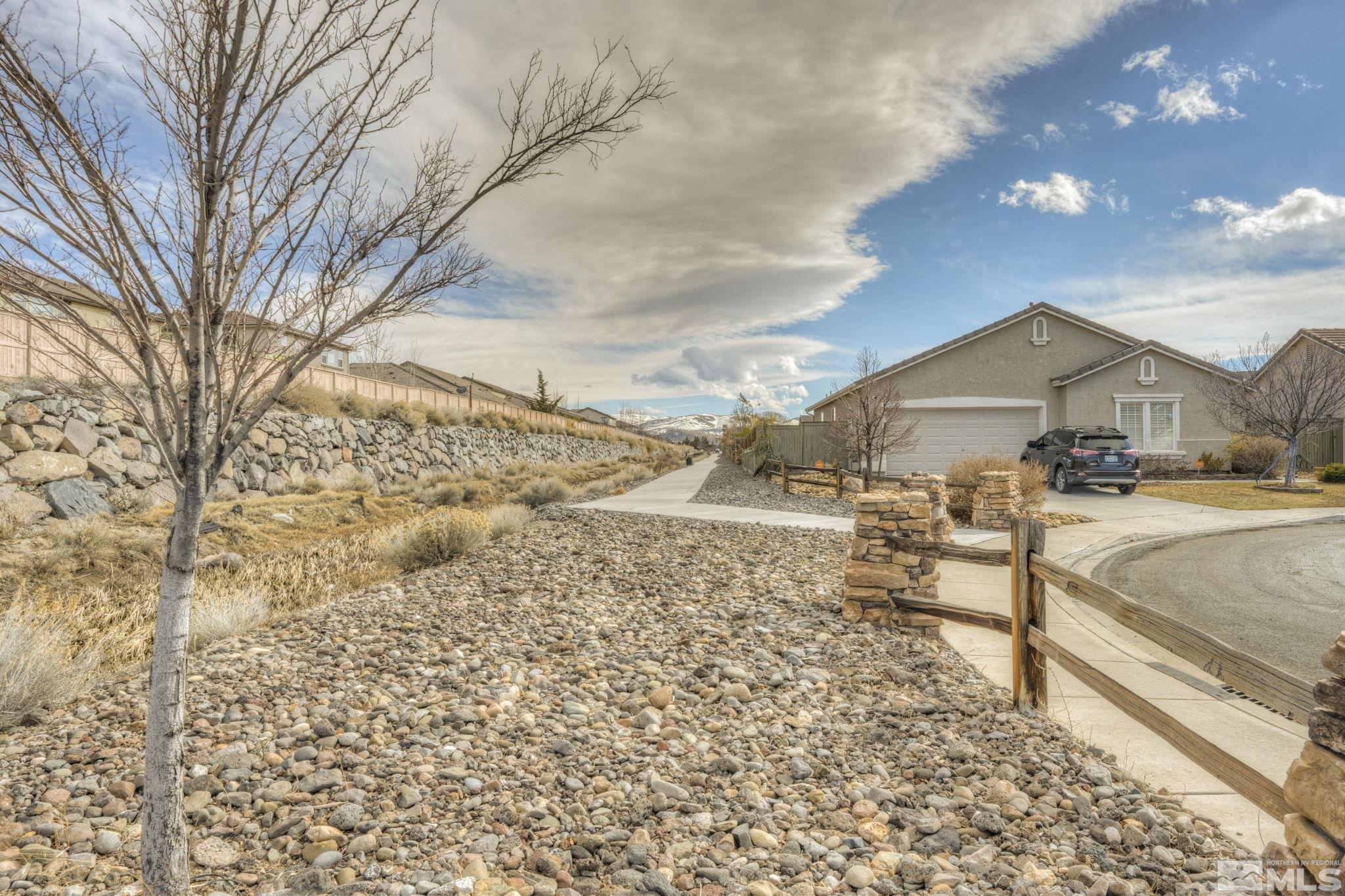 1825 D'Arques Court Reno, NV 89521 - Photo 39 of 40 a view of road with large trees