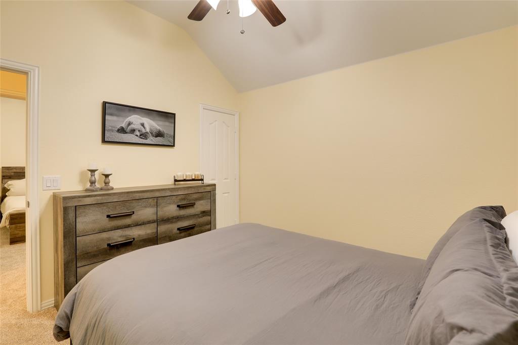 4502 Ridgeway Drive Mansfield, TX 76063 - Photo 16 of 29 a bedroom with a bed and a window
