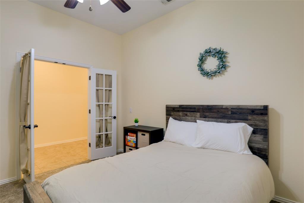 4502 Ridgeway Drive Mansfield, TX 76063 - Photo 21 of 29 a bedroom with a bed and a window