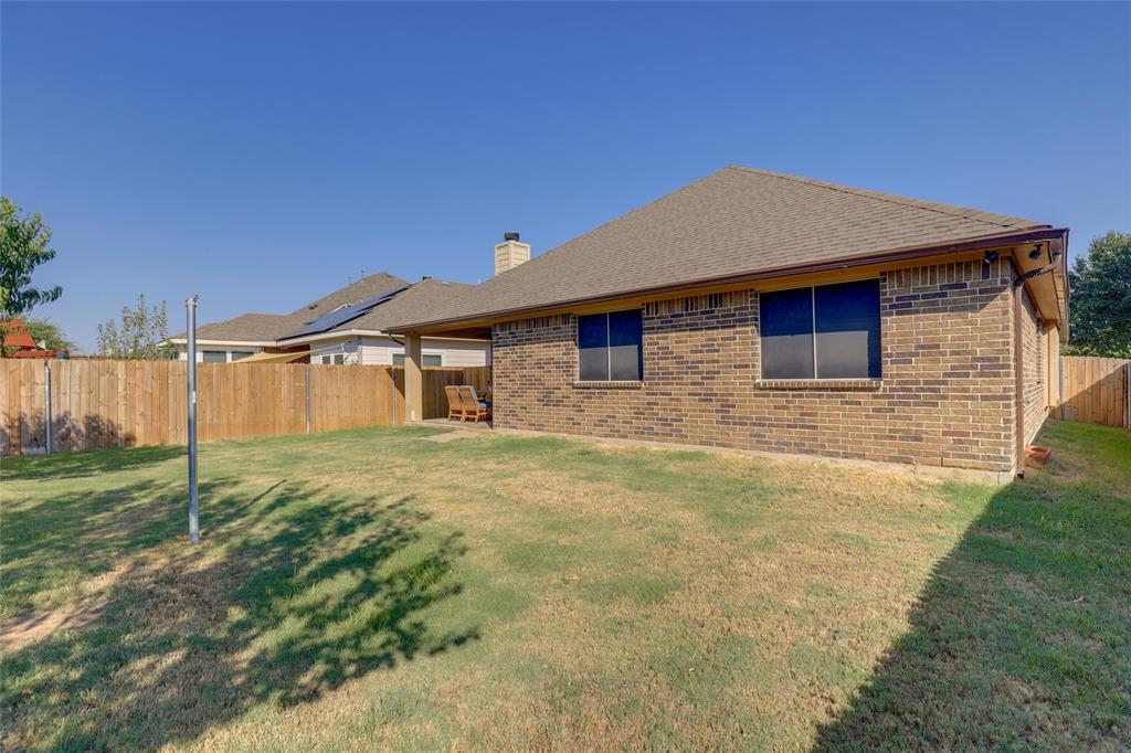 4502 Ridgeway Drive Mansfield, TX 76063 - Photo 29 of 29 a front view of a house with yard