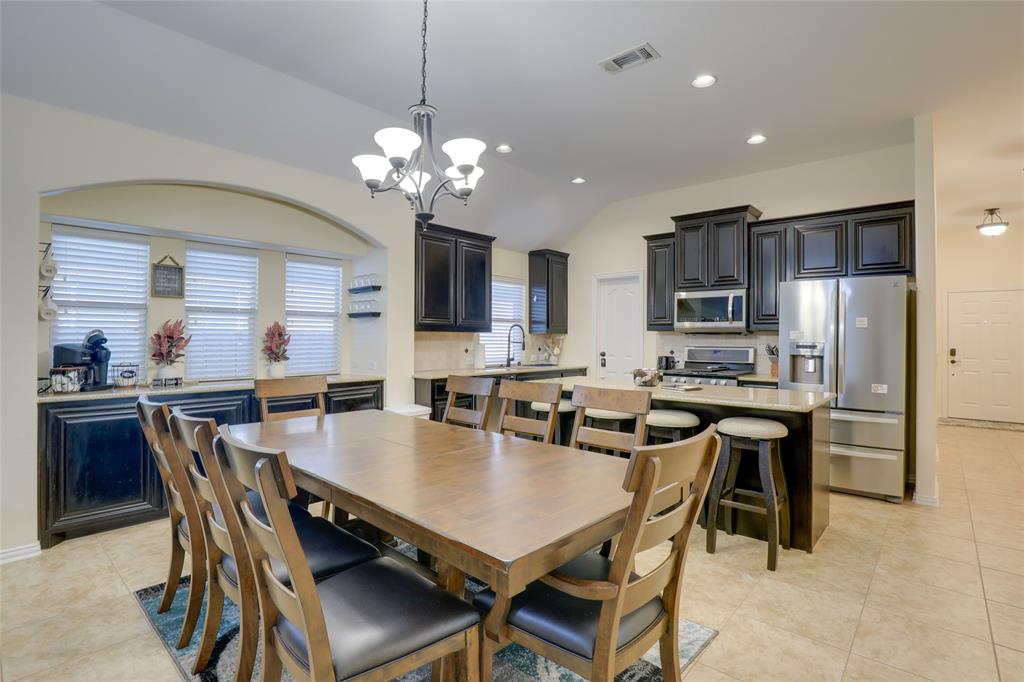 4502 Ridgeway Drive Mansfield, TX 76063 - Photo 10 of 29 a view of a dining room with furniture