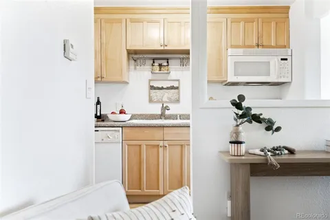 a bathroom with a sink and a window