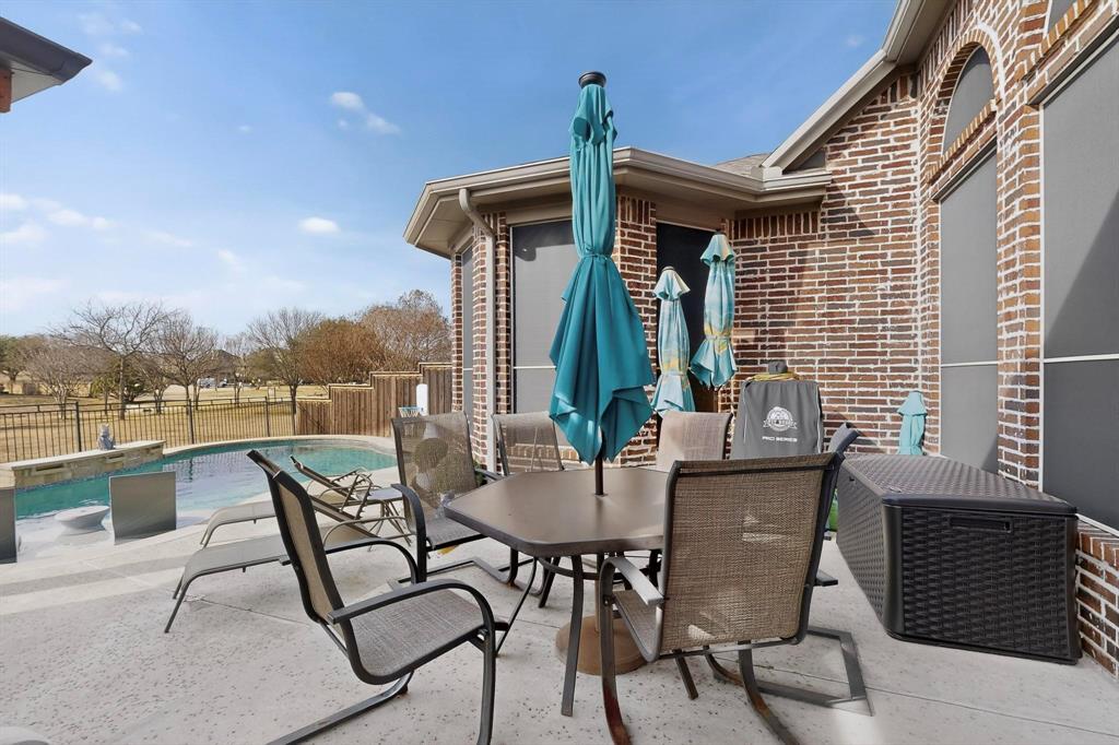 7625 Ridgedale Court Sachse, TX 75048 - Photo 36 of 40 View of patio / terrace featuring outdoor dining area
