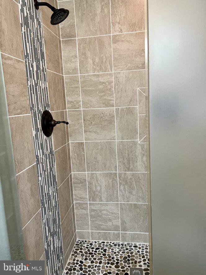 1055 Redeye Road Lusby, MD 20657 - Photo 14 of 38 Gorgeous Custom Tile in Prim Bath