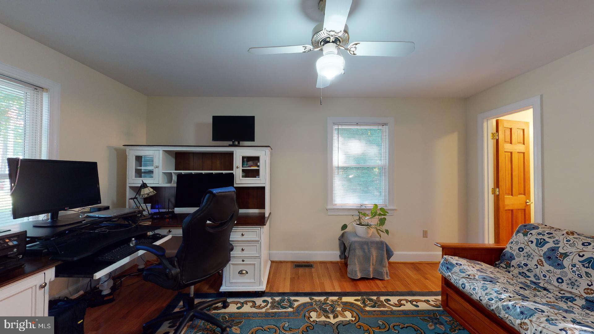 1055 Redeye Road Lusby, MD 20657 - Photo 21 of 38 Hardwood Flooring, Ceiling Fan