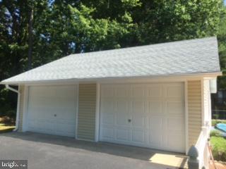 1055 Redeye Road Lusby, MD 20657 - Photo 30 of 38 Detached 2 Car Garage with extra Parking Area