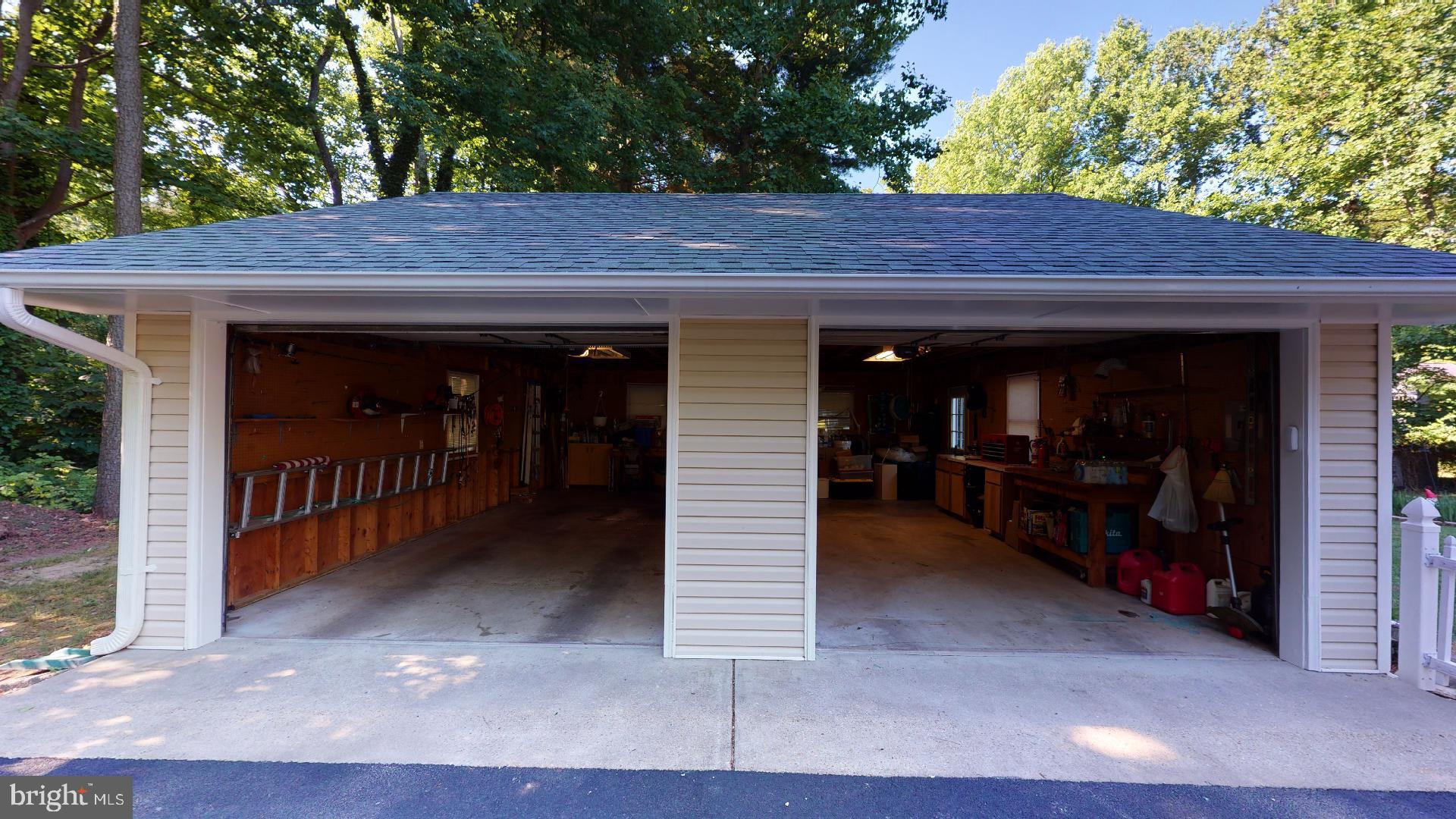 1055 Redeye Road Lusby, MD 20657 - Photo 31 of 38 Extra Area for Storage inside & outside of garage