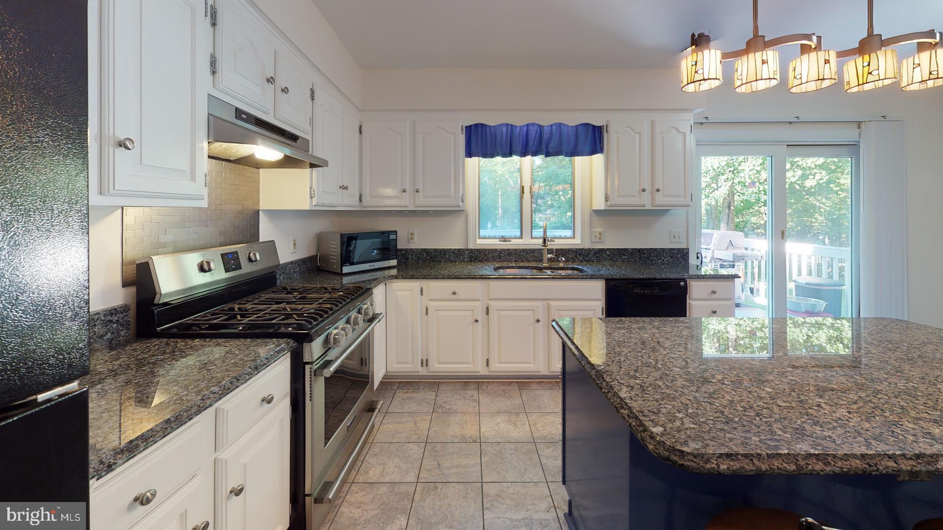 1055 Redeye Road Lusby, MD 20657 - Photo 7 of 38 Gas Stove, Granite Counters