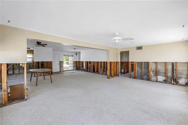 a view of livingroom with furniture and couches