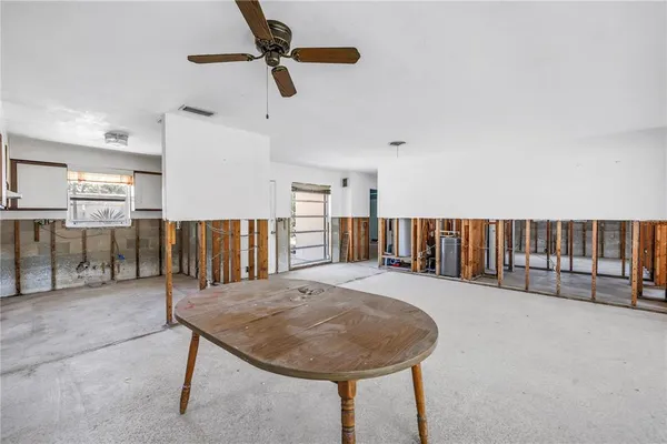 a view of a hallway with seating area