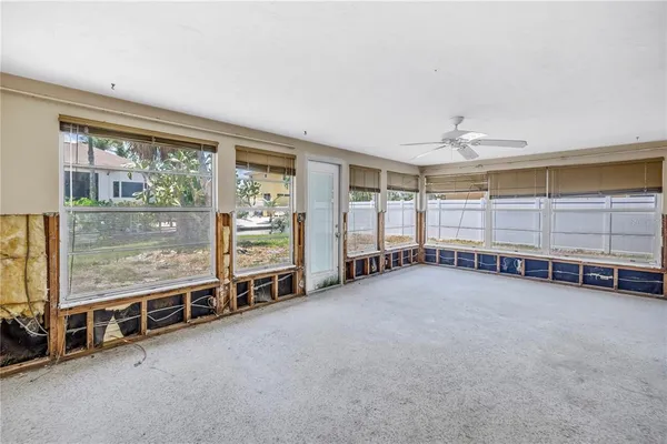 a view of an empty room with stairs