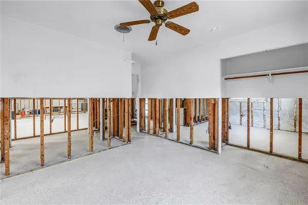 a view of house with outdoor space and swimming pool