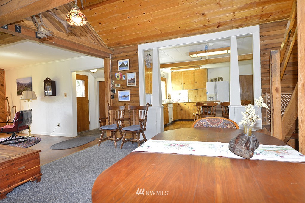322 North End Omak Lake Road Omak, WA 98841 - Photo 32 of 40 a view of a livingroom with furniture window and wooden floor