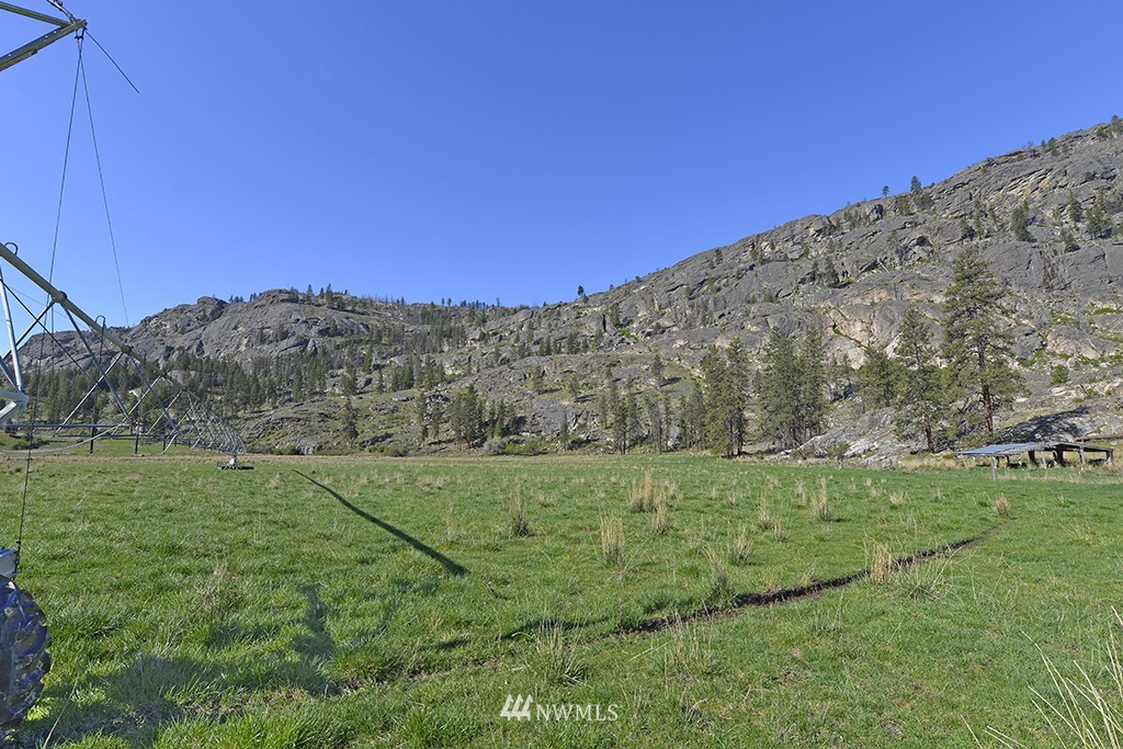 322 North End Omak Lake Road Omak, WA 98841 - Photo 40 of 40 a view of a field with an outdoor space